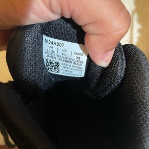 ASICS kids wrestling shoes.